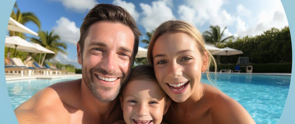 Happy family enjoying their newly resurfaced pool in Miami, with children playing and adults relaxing.